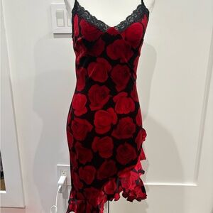 Vintage red velvet floral mini dress with ruched details!